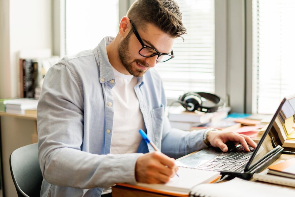 Business Man at desk on computer